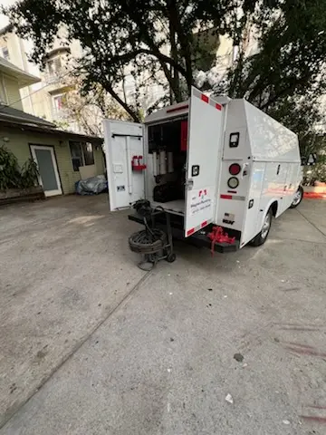 Magnet Plumbing service vehicle on-site for Water Heater Repair in The Noles Estates